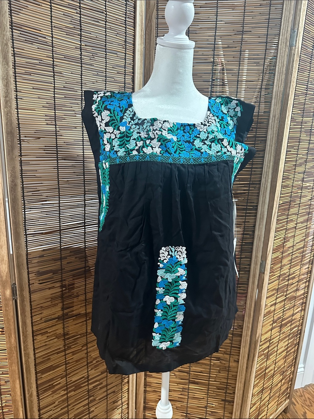 Embroidered Black Sleeveless Top with Blue-Green Floral Accents